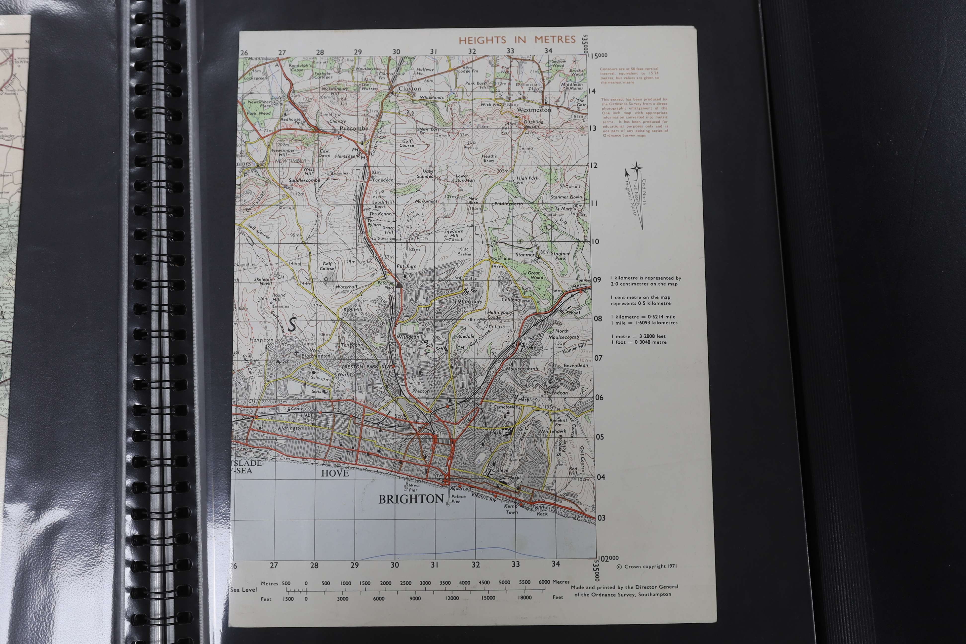 Two folders containing eighty-one mainly 18th and 19th century maps and charts, etc. relating to Sussex and it’s environs, including; engravings from books, some in mounts, town plan of Brighton, distance charts, etc.